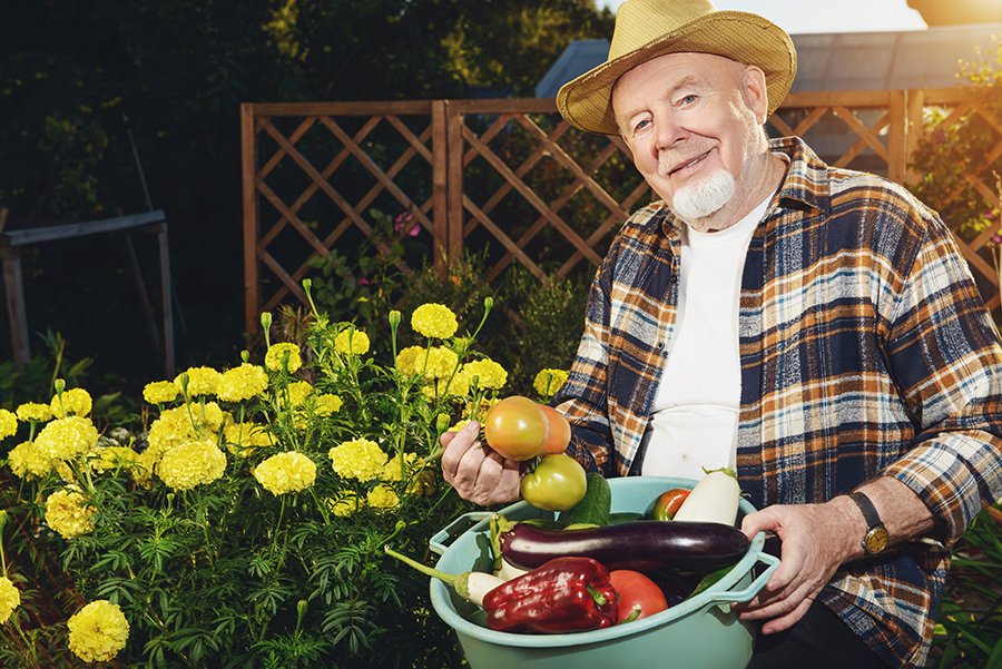 photo of happy senior gardening