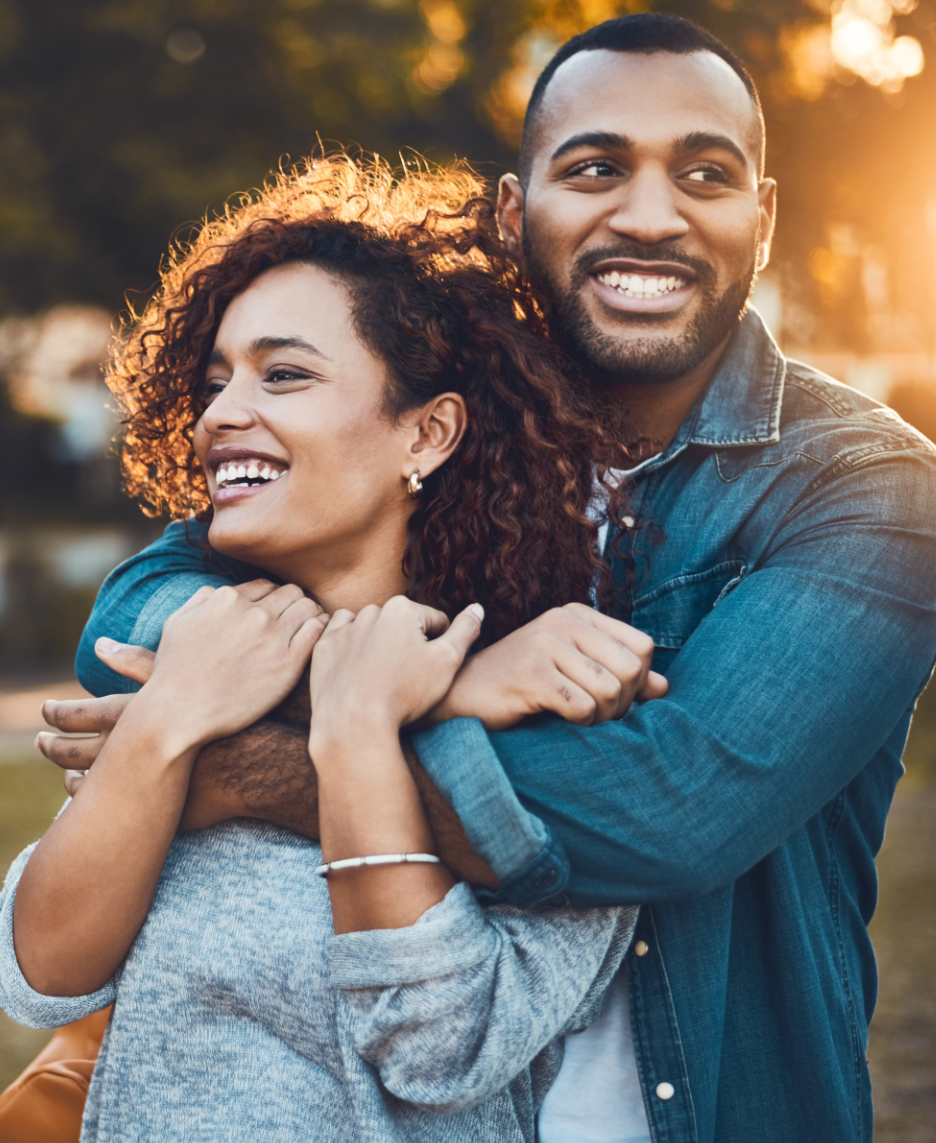 Theyre inseparable. an affectionate young couple bonding together outdoors. couples preconception photo